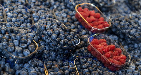 blueberries and raspberries in the vegetable market