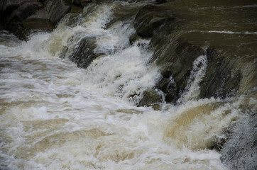 water flowing over rocks