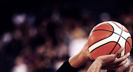 basketball player shooting three pointer