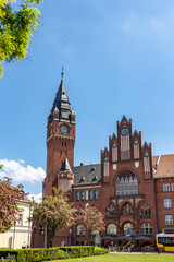 Naklejka premium View from the historic brick Gothic City Hall in Berlin Koepenick at sunny blue sky