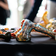 Design accessories for smoking marijuana on the black background