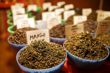 Indian green and black fruit tea on the counter of Goa night market