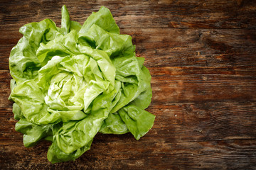 Aerial photo of fresh lettuce on desk 