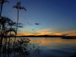 Sunset over Amazonian lagoon