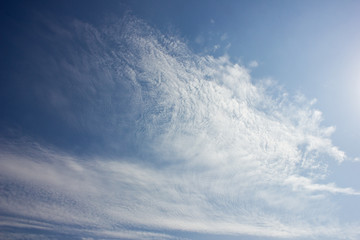 Naklejka na ściany i meble background blue sky with cirrus clouds close up