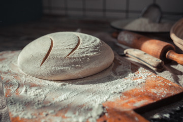 Baking ingredients placed on wooden table, ready for cooking. Concept of food preparation, Making bread at home, kitchen on background.