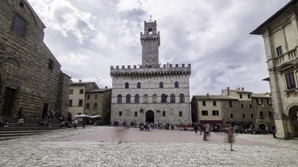 Montepulciano 2019. Time lapse of Piazza Grande in Montepulciano and the Palazzo Comunale of Montepulciano, in 4K. The day is cloudy and the square is full of tourists. April 2019 in Montepulciano.
 - Powered by Adobe