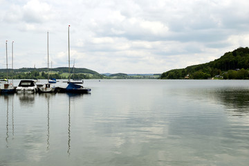 Fototapeta na wymiar View of the Mattsee in Salzburg / Austria. boats on lake