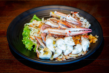 seafood  - steam crab meat served in white plate on wooden table