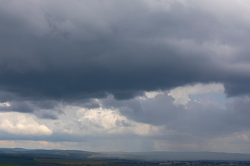 dramatic stormy sky with rain showers