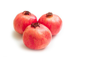 Juicy Ripe Pomegranate Isolated On White Background. pomegranate on white