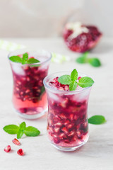 Pomegranate green tea cocktail. Selective focus, space for text.