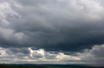 Obraz na płótnie Canvas dramatic stormy sky with rain showers