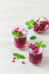 Pomegranate mojito cocktail. Top view, space for text.