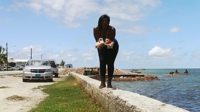 The Original Bahama Mama Holding Conch Shell, Conch Shell Palace,  West End Grand Bahama, Bahamas