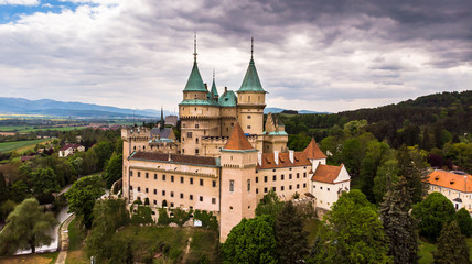 Aerial view of Bojnice medieval castle, UNESCO heritage in Slovakia. Romantic castle with gothic and Renaissance elements built in 12th century.