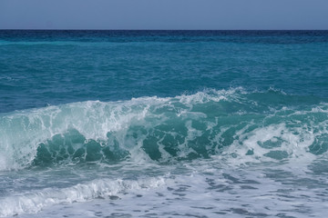 Naklejka na ściany i meble Clean sea water. Beautiful sea waves.
