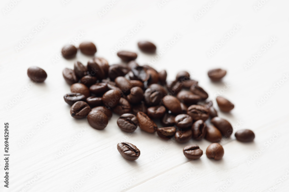 Poster Coffee  beans isolated on white background with copyspace for text. Coffee background or texture concept.