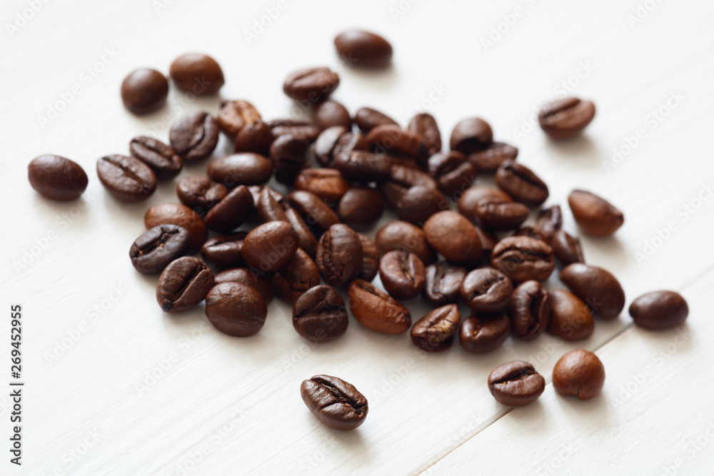 Poster Coffee  beans isolated on white background with copyspace for text. Coffee background or texture concept.