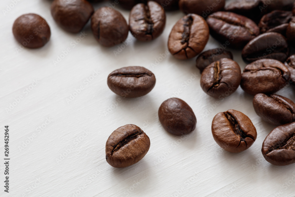 Poster Coffee  beans isolated on white background with copyspace for text. Coffee background or texture concept.