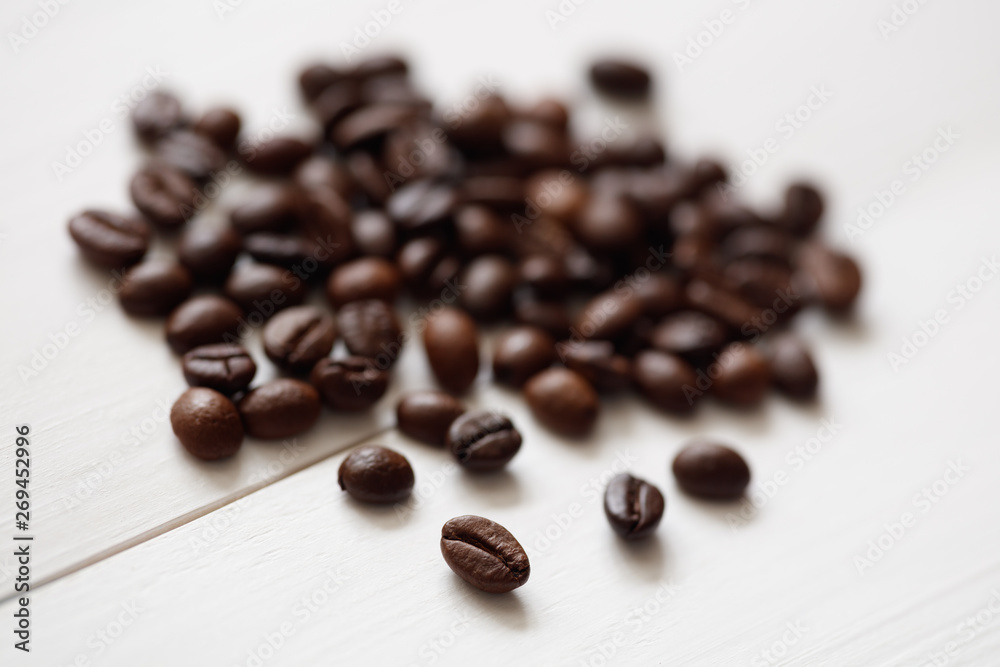 Poster Coffee  beans isolated on white background with copyspace for text. Coffee background or texture concept.
