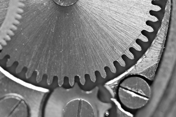 Concept Teamwork or successful business design. Black and white photo background  of old metal gears or parts. Macro