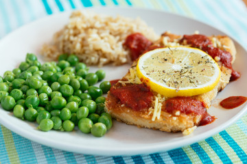 Lemon tofu romano with peas and rice