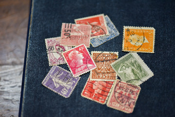 Old postage stamp on the table