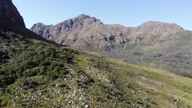 aerial flight through rugged mountains and valley in south africa