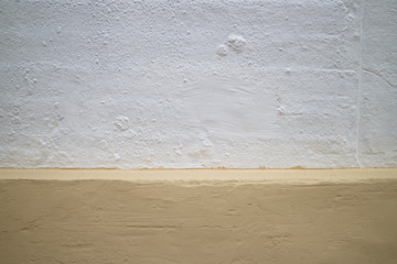 White and yellow concrete wall