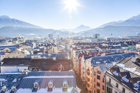 Austria, Tyrol, Innsbruck, Panoramic views of the city with snow-capped Alps in background