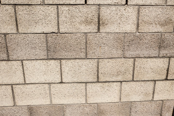Obraz premium brick wall with rough stones background