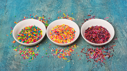 Bright colorful sugar sprinkles or confetti as baking decor