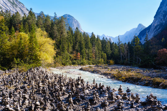Austria, Tyrol, Karwendel mountains, Hinterautal, cairns at River Isar