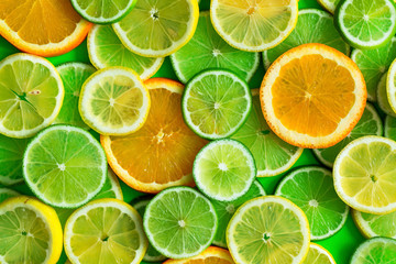 Citrus fruits slices texture background