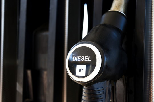 New fuel labeling at petrol station pumps with new EU labels, sunny day