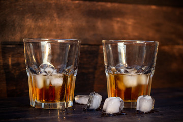 Whiskey in glass with ice