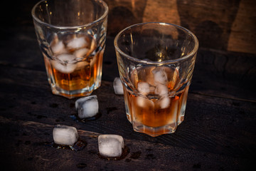 Whiskey in glass with ice