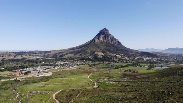 dramatic aerial view of a road leading to simonsberg mountain peak in stellenbosch, South Africa