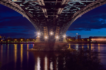 under the Theodor-Heuss bridge in Mainz with view to Mainz during blue hour