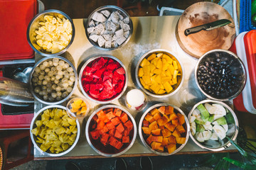 Exotic fruits of Thailand for shakes and smoothies. Mango, papaya, pineapple, jackfruit, mangosteen, quince, pitaya (Dragon Fruit) In the Thai market