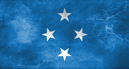 Flag of Federated States of Micronesia, concrete background, dirty.