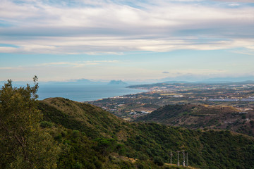 Fototapeta premium Landscape. View of the mountains and the sea from the observation deck of the city of Estepona.