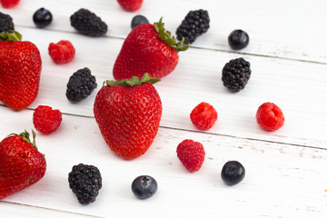 Fruits of the Forest Berries on a Wood Table