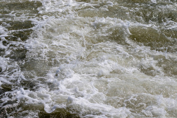 Surface of the water behind the ship on the ocean