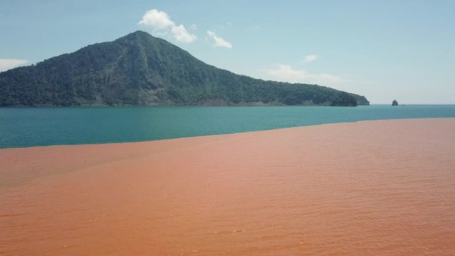 Undersea Volcanic Activity At Anak Krakatau Turns Ocean Orange