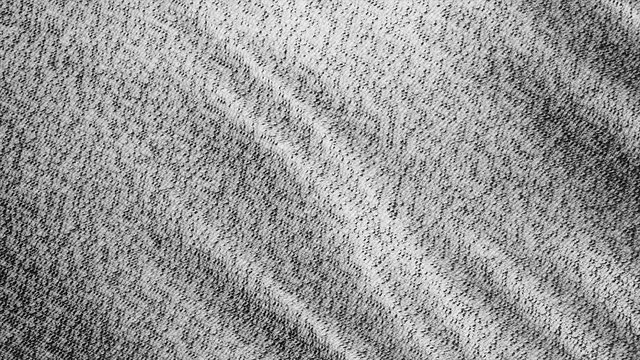 Black and white burlap texture background macro shot. Detailed grey fabric cloth background waving. 