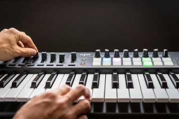 MIDI keyboard synthesizer piano keys closeup for electronic music production / recording