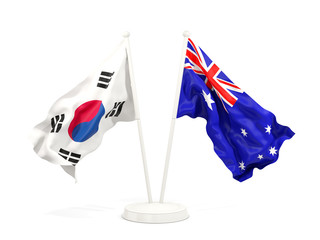 Two waving flags of South Korea and australia isolated on white