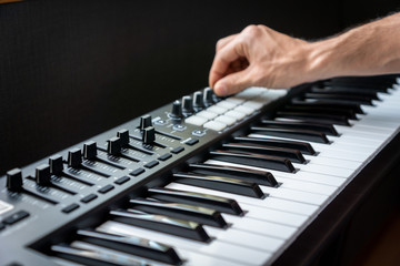 MIDI keyboard synthesizer piano keys closeup for electronic music production / recording